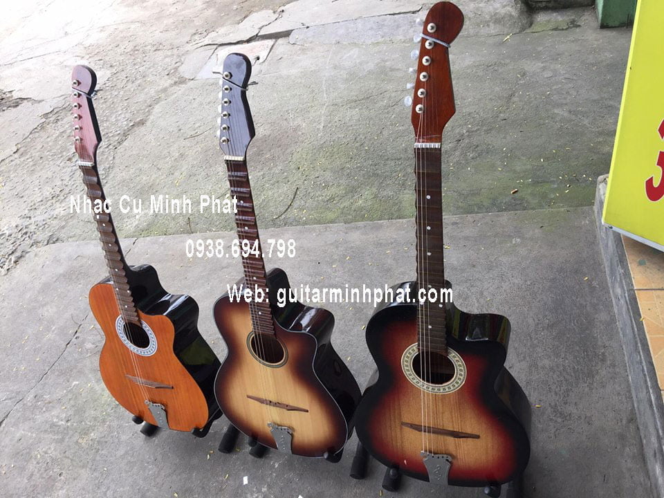 Cửa hàng bán guitar cổ thùng %C4%91%C3%A0n-guitar-th%C3%B9ng-ph%C3%ADm-l%C3%B5m-gi%C3%A1-r%E1%BA%BB