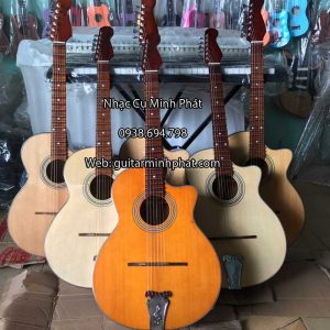 Hình ảnh chi tiết mặt trước gỗ thông của đàn guitar thùng phím lõm vọng cổ