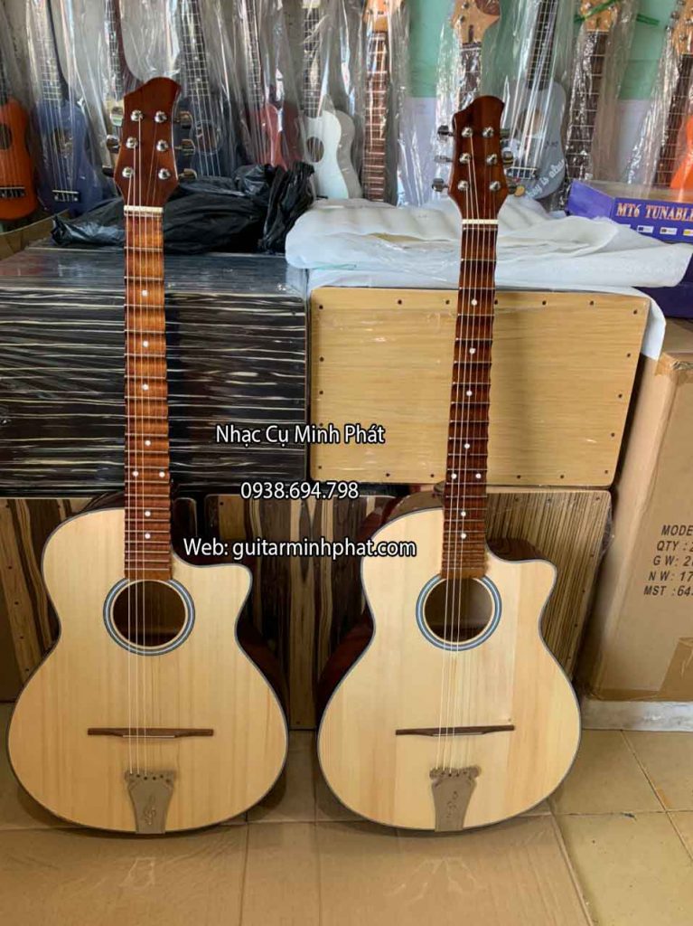Hình ảnh chi tiết mẫu guitar vọng cổ mặt gỗ tự nhiên màu sáng - liện hệ 0938 694 798 để đặt hàng nhé !