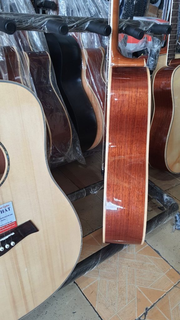 dan guitar acoustic go hong dao dang D Can Boc Tut MP A08 5