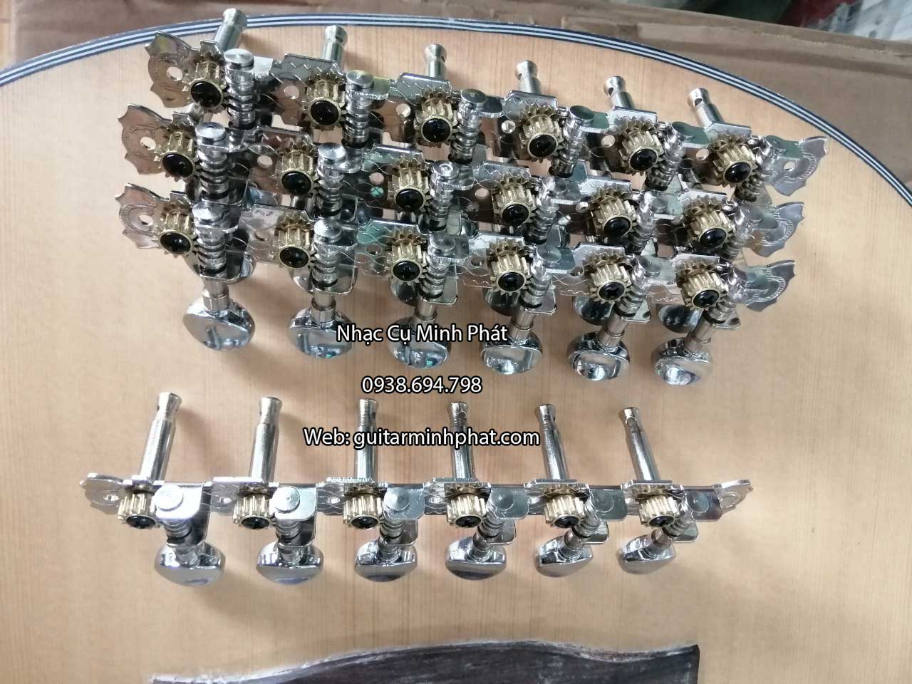 khoa-dan-guitar-phim-lom-inox khoa dan guitar phim lom