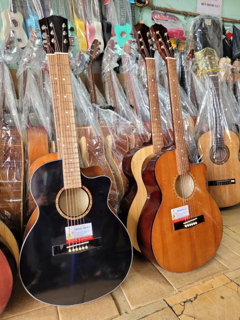 Đàn Guitar Tập Chơi Giá Rẻ - MP-04 ( Có ty chỉnh cần) 12 Đàn Guitar Tập Chơi Giá Rẻ MP-04 – Lựa Chọn Số 1 Cho Người Mới Bắt Đầu (Từ 1 Triệu)