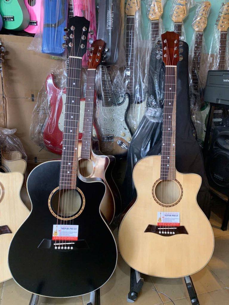 Đàn guitar Acoustic giá rẻ cho ngươi mới học 6 Đàn guitar acoustic giá rẻ cho người mới học màu đen và màu mộc tại Guitar Minh Phát