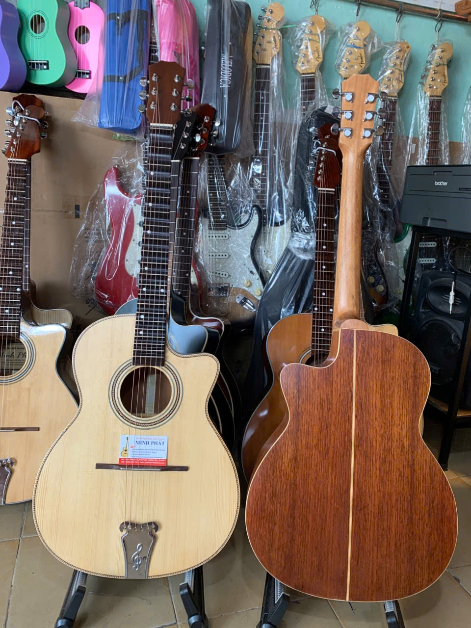 dan-guitar-phim-lom-go-hong-dao-ky-bong-lua-guitar-minh-phat (1) dan guitar phim lom go hong dao ky bong lua guitar minh phat 1